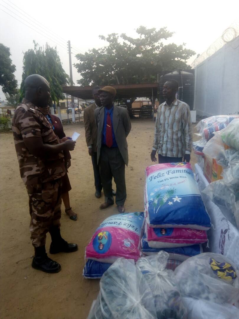 Delivering relief items to a Ghana Prisons Service facility.