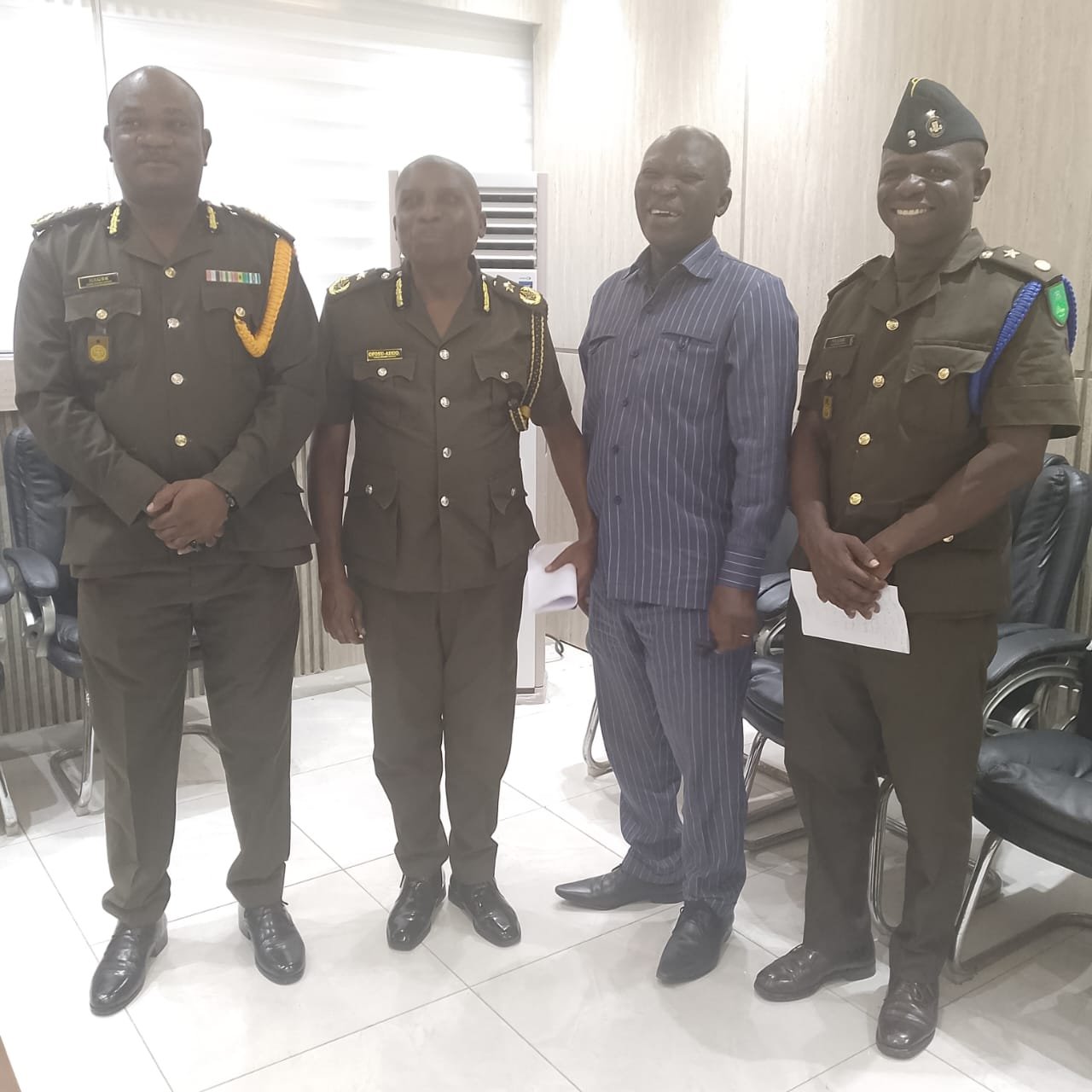 The ministry team with officers of the Ghana Prisons Service.