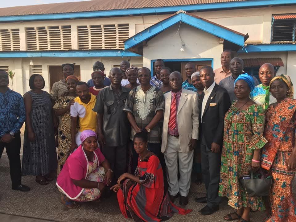 Volunteers and community members gathered at a prison outreach.